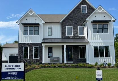 exterior of home with new home information sign